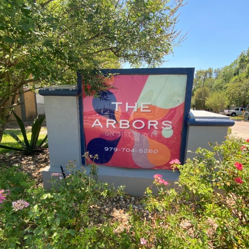 Community sign at Arbors on 31st in Bryan, Texas