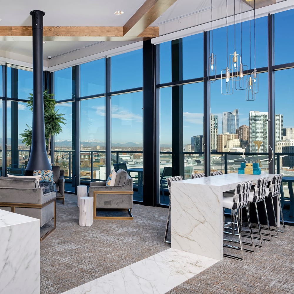 Floor to ceiling windows at Pool table and lounge at Civic Lofts in Denver, Colorado