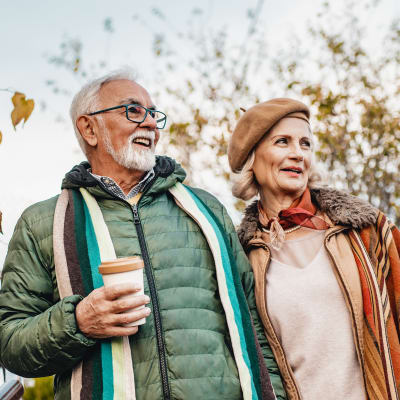A resident couple taking a walk at Chandler's Square Retirement Community in Anacortes, Washington