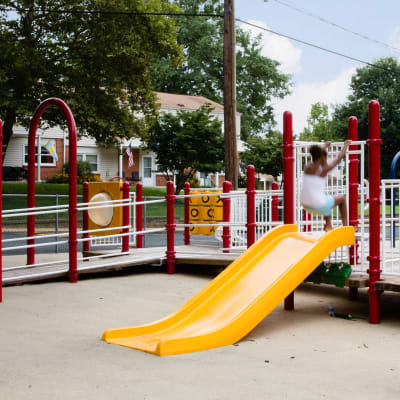 A child playing at a playground at North Severn Village in Annapolis, Maryland