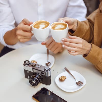 Residents break for coffee will photographing near Ironwood at Happy Valley in Phoenix, Arizona