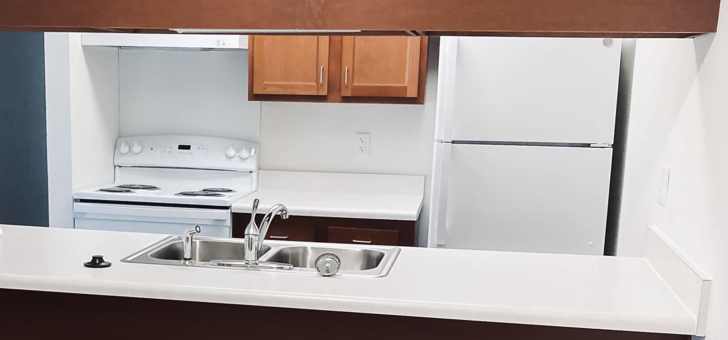 Modern kitchen at Maple Heights Apartments in Saline, Michigan