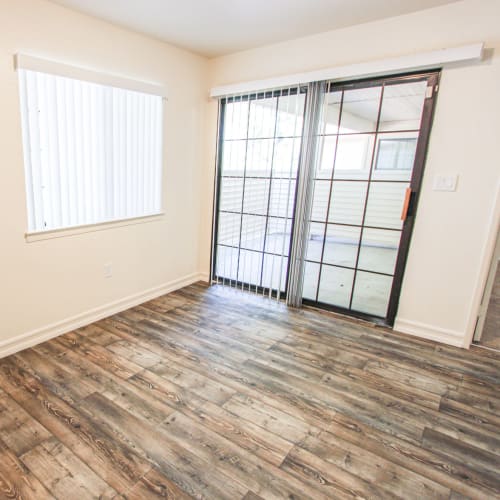 A sliding glass door in a home at Howard Gilmore Terrace in La Mesa, California