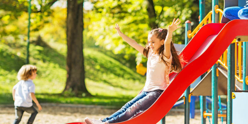 young kids playing on the playground at Edson in Oceanside, California