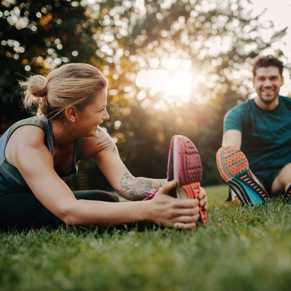 Residents exercising on the field at Crystal Springs in Fort Worth, Texas