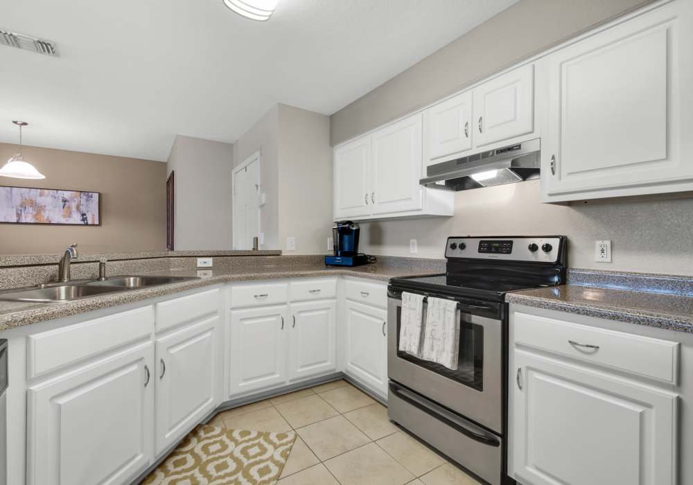 Kitchen with stainless-steel appliances at Reserve at Northshore in Lynn Haven, Florida