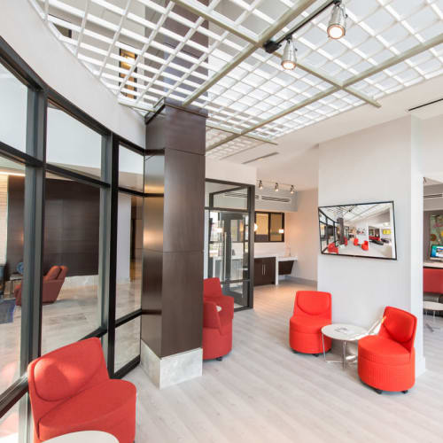 Stunning resident lounge with ample seating options and a large flatscreen TV at Solaire 10914 Georgia in Silver Spring, Maryland