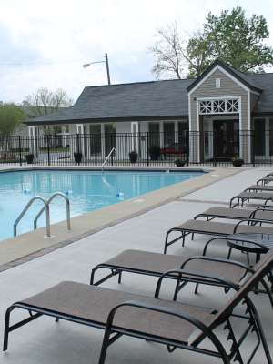 Swimming pool with lounge chairs at The Abbey at Riverchase in Hoover, Alabama