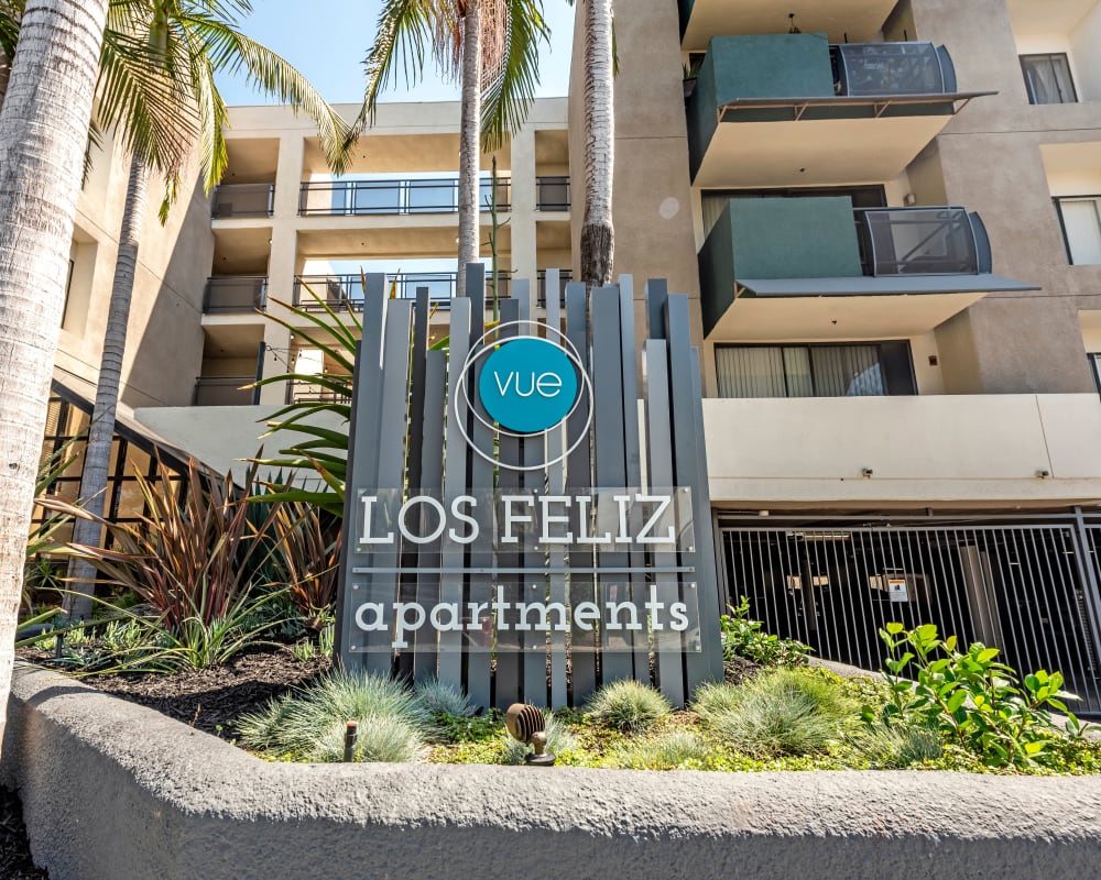 Exterior view of resident buildings with our sign out front at Vue Los Feliz in Los Angeles, California