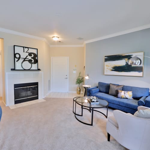 Fireside lounge at Village at Potomac Falls Apartment Homes in Sterling, Virginia