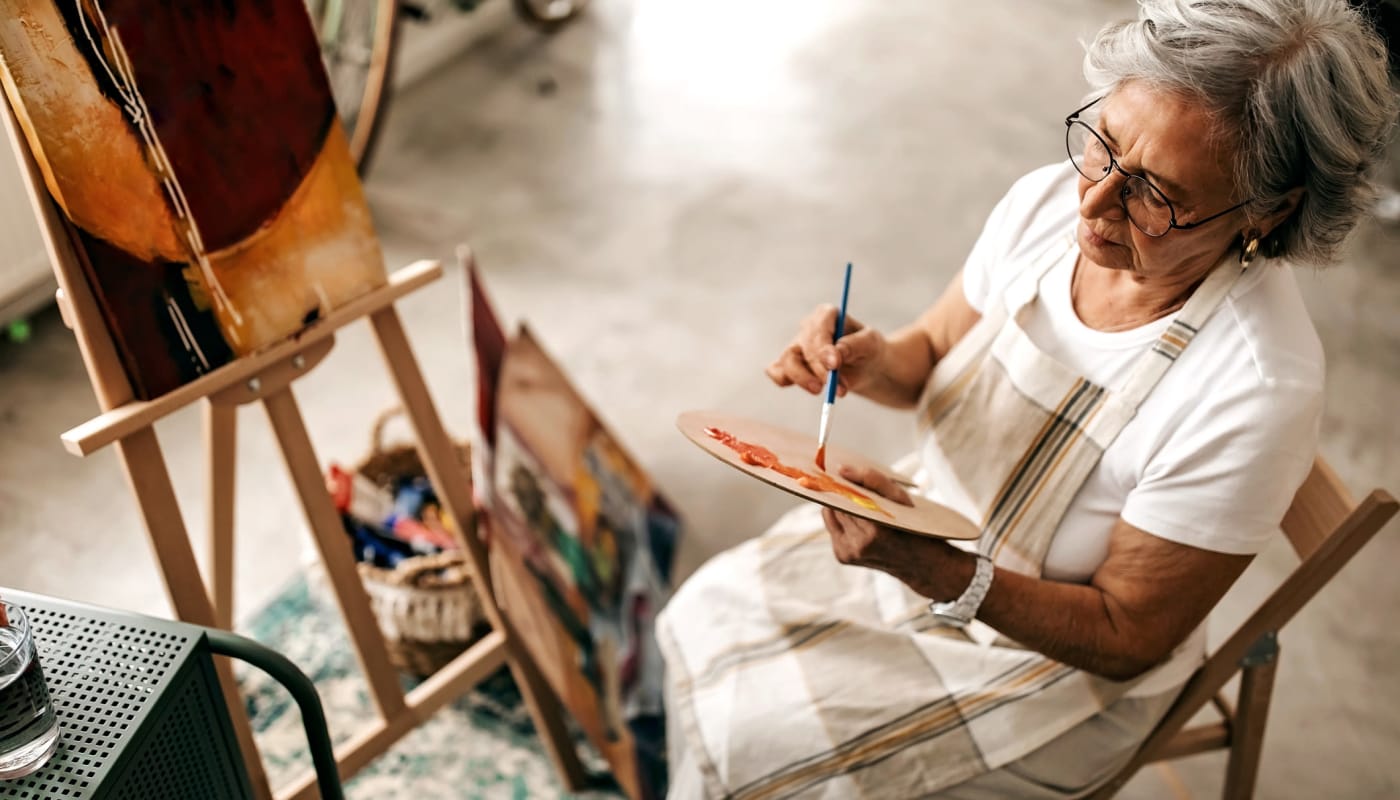 Resident painting at The Pillars of Mankato in Mankato, Minnesota