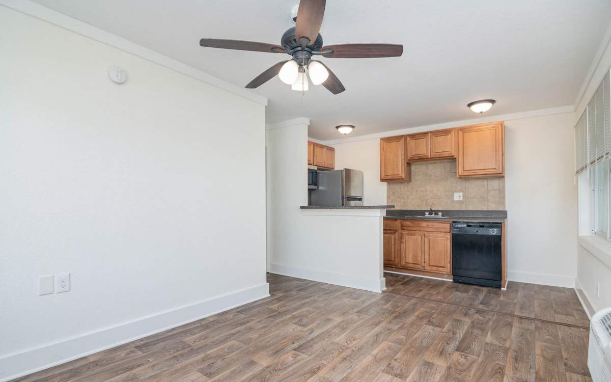 Unfurnished living room with open kitchen at Ocean View Living in Norfolk, Virginia