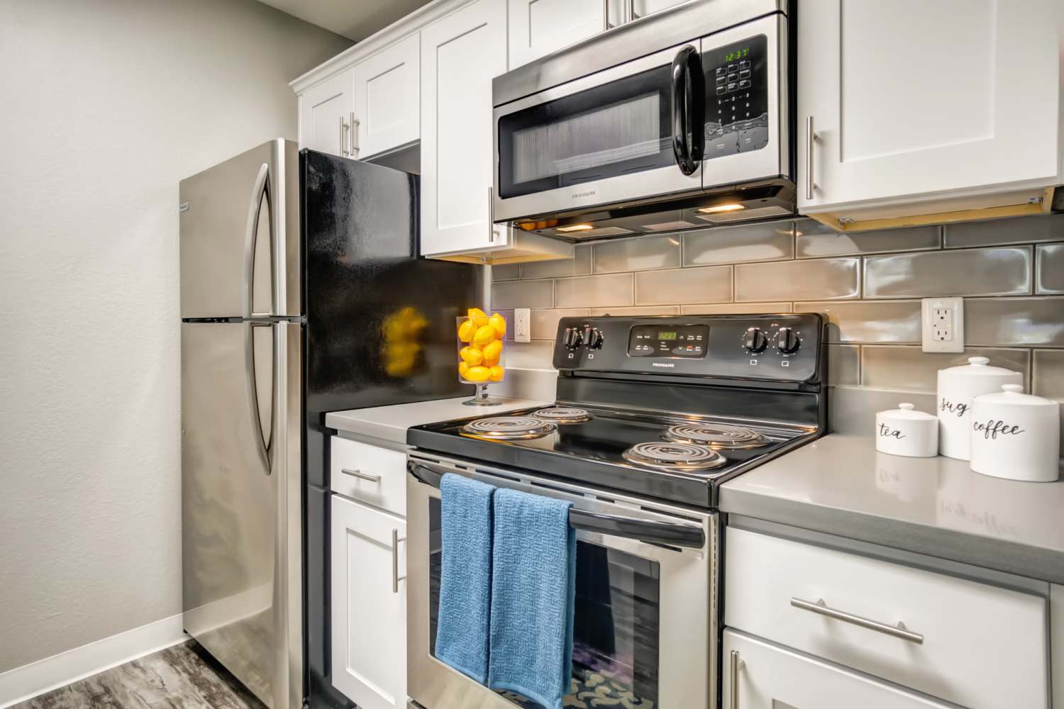 A kitchen, with tile backsplash at Serramonte Ridge Apartment Homes in Daly City, California