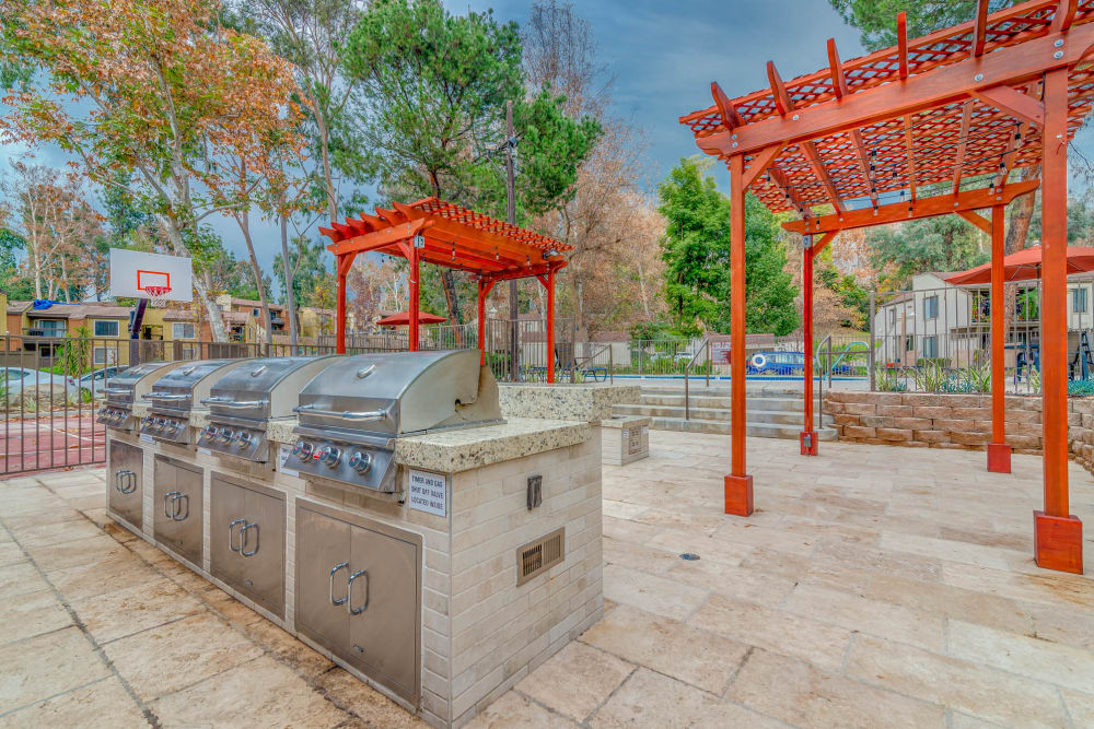 BBQ area at Sycamore Canyons Apartments in Riverside, California