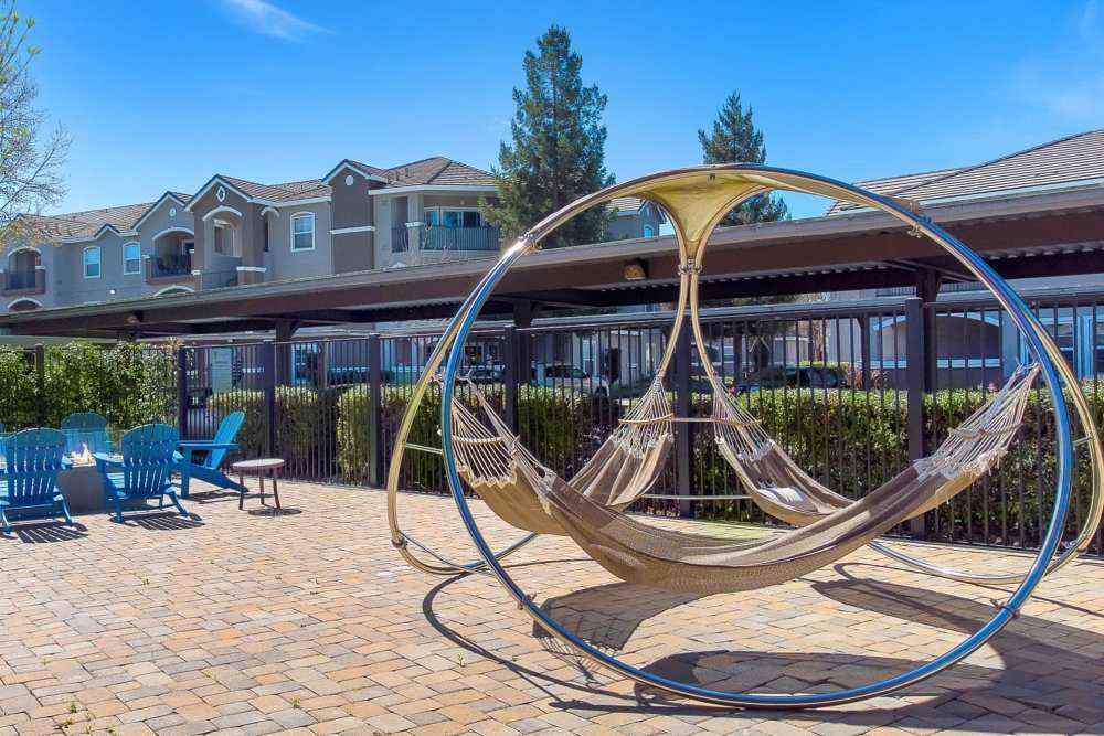 Outdoor Seating with Hammock at Hawthorn Village Apartments in Napa, California