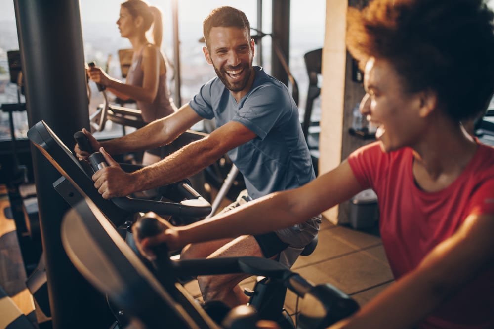 Resident enjoying the gym at The Abbey at Sonterra in San Antonio, Texas