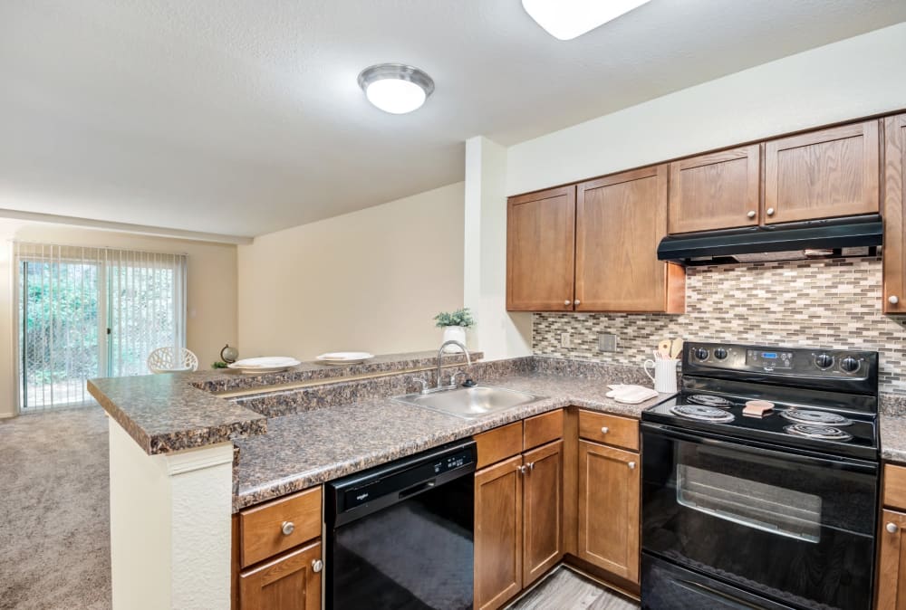 Fully-equipped kitchen at St. Mary's Landing Apartments & Townhomes in Lexington Park, Maryland