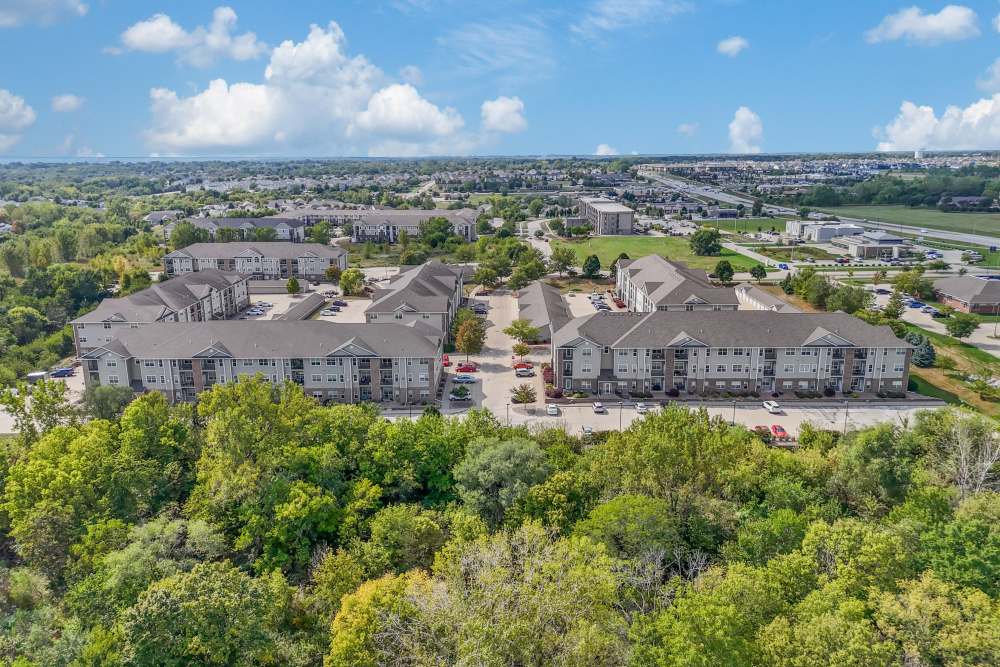 Serene retreat with lush landscaping and charming courtyard at Pointe 28 in Ankeny, Iowa.