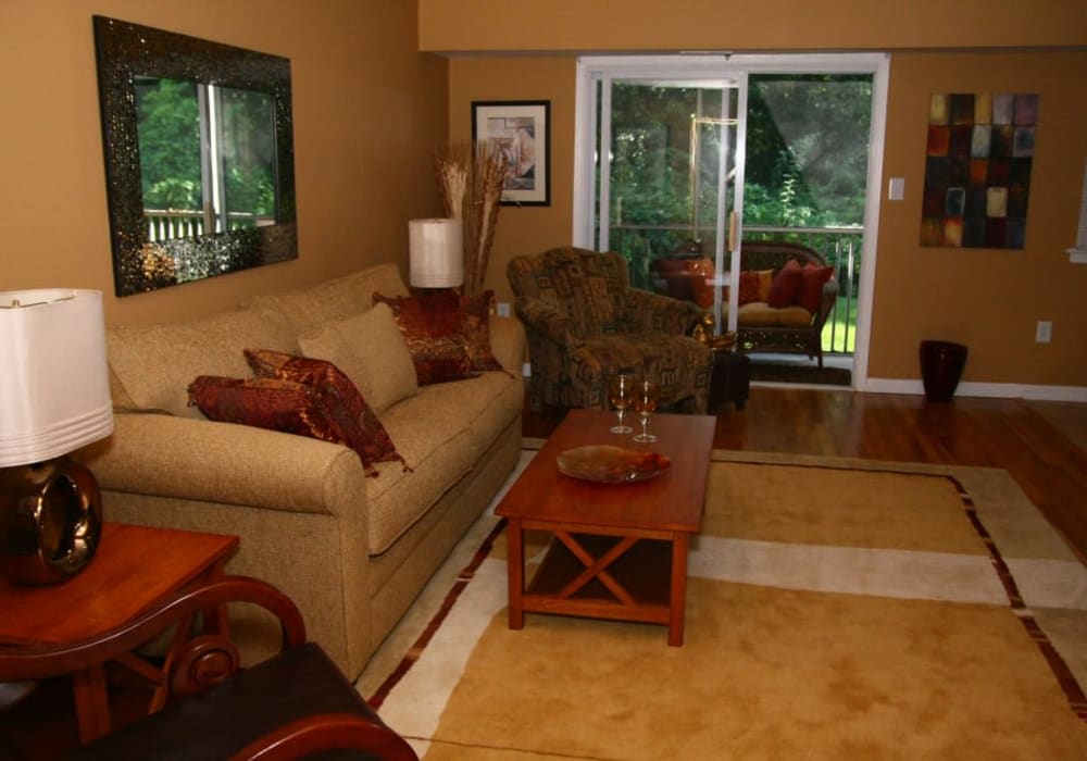 Living room with hardwood floors of Kuser Village with pool in Hamilton, New Jersey