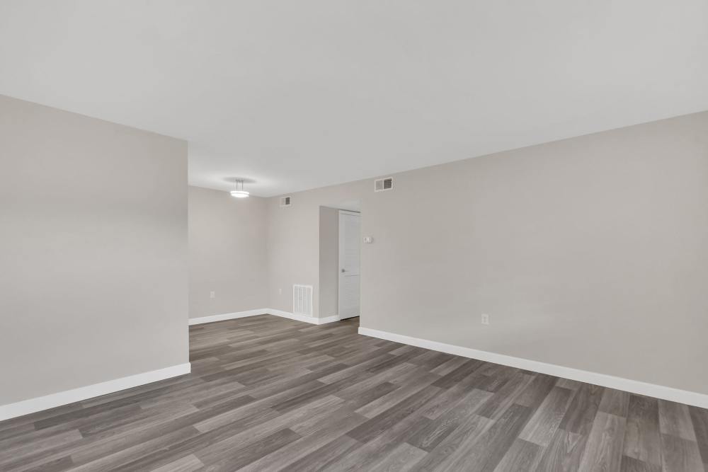 Spacious open layout with wood-style flooring at Bridgewater Retreat in Kingsport, Tennessee