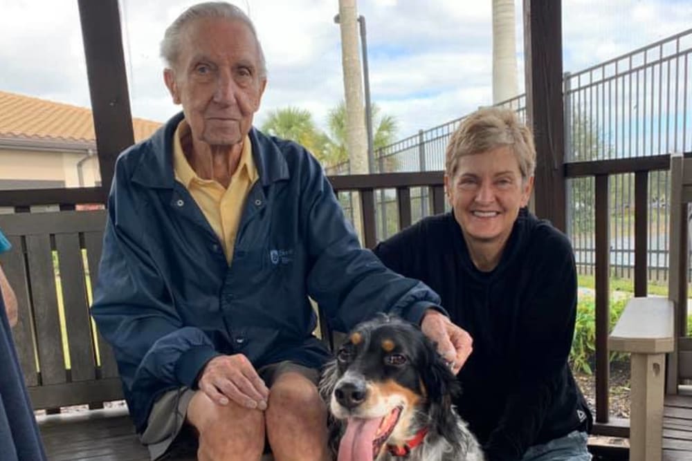 A resident and his dog at Inspired Living Bonita Springs in Bonita Springs, Florida