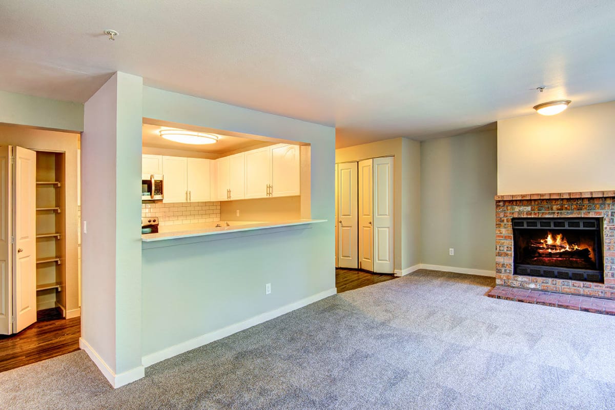 Apartment fireplace and living room at Heronfield in Kirkland, Washington