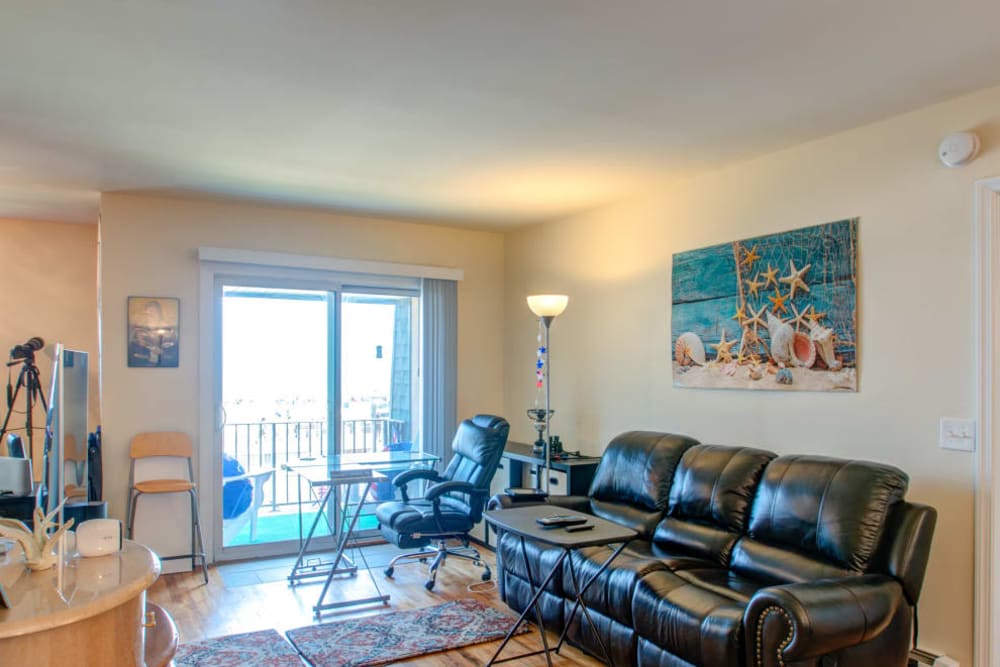 Living room at Ocean Harbor Apartments in Belmar, New Jersey