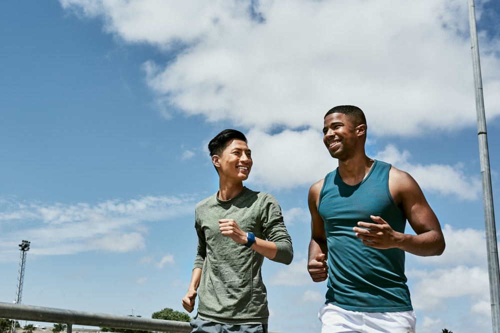 Residents jogging at Parkview Terrace Apartments in Redlands, California