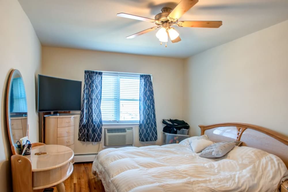 Bedroom at Ocean Harbor Apartments in Belmar, New Jersey