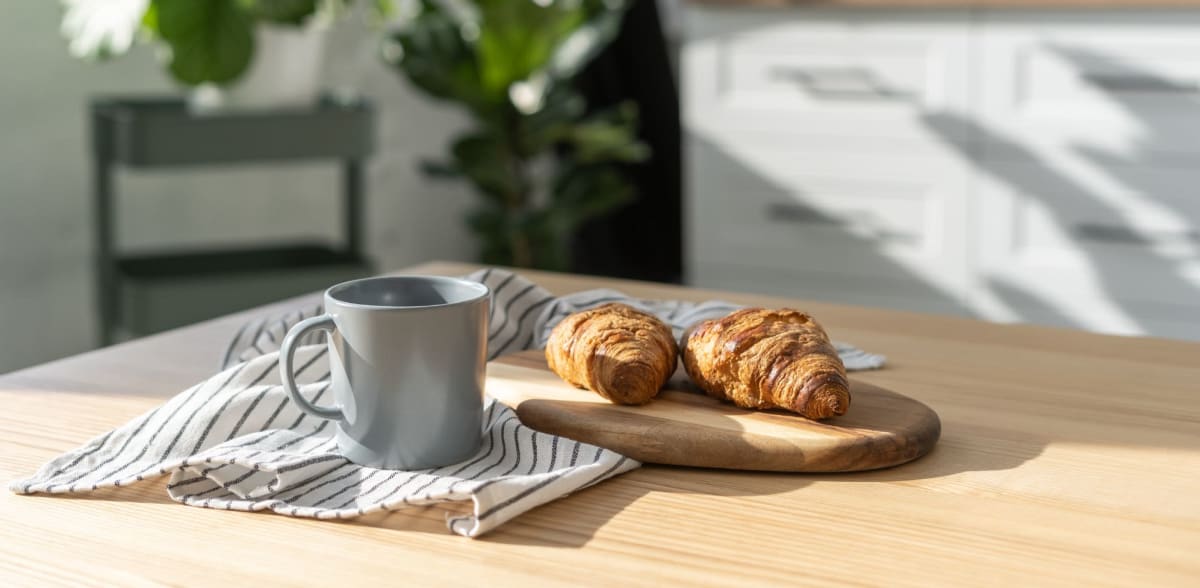 Coffee and pastries on a table at Mason Avenue, Alexandria, Virginia