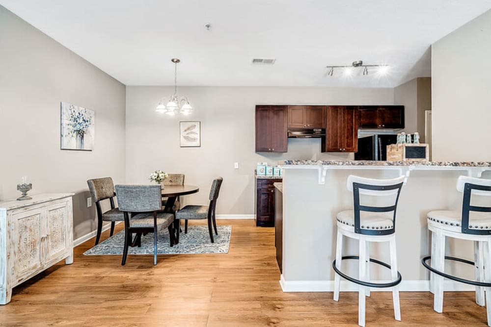 Dining area with counter top seating at Westshore Palms in Panama City, Florida