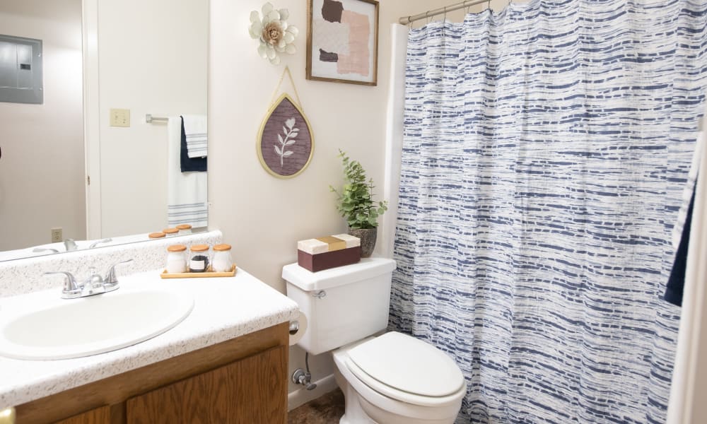 Beautiful bathroom with vast counterspace at The Mark Apartments in Ridgeland, Mississippi