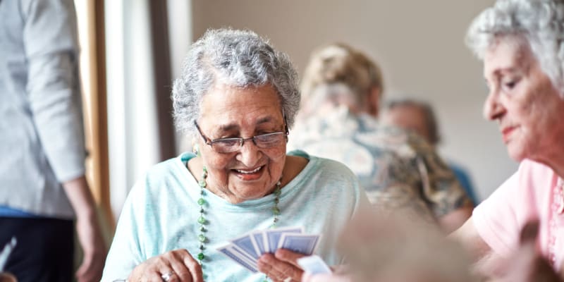 Residents playing cards at The Blake at Biloxi in Biloxi, Mississippi