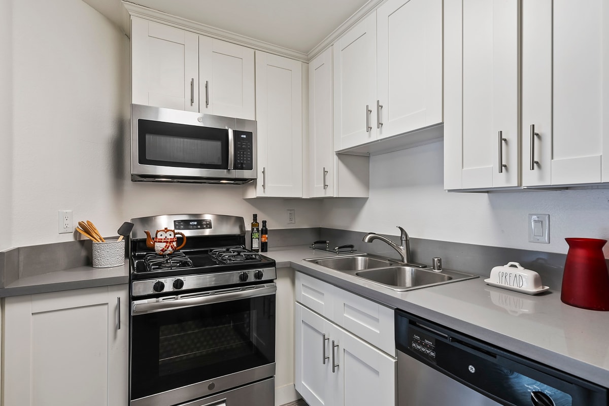 Kitchen with stainless-steel appliances at Media Towers, Los Angeles, California 