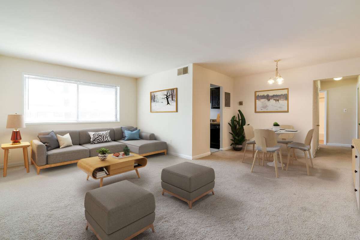 Walk-in closet with carpet flooring at Parkway Apartments in Temple Hills, Maryland
