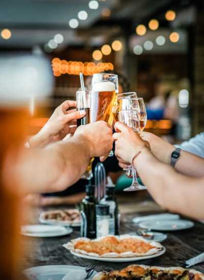 Friends drinking beer near Wrenfield at Pleasant View in , WI