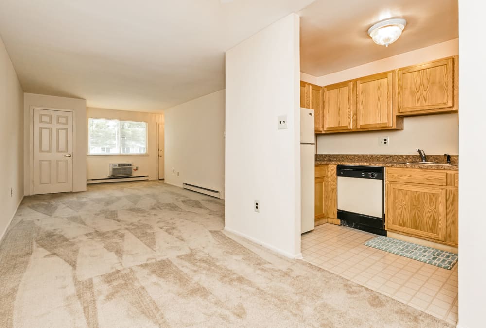 Spacious living room and open kitchen at Lincoln Park Apartments & Townhomes in West Lawn, PA
