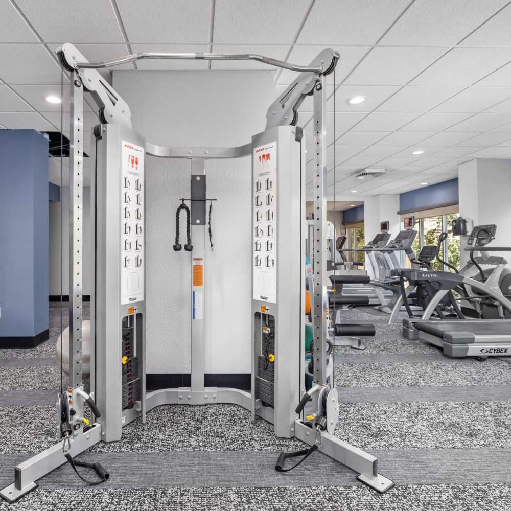 Modern fitness center with state-of-the-art cables and weights at The View at Forest Park in St. Louis, Missouri.