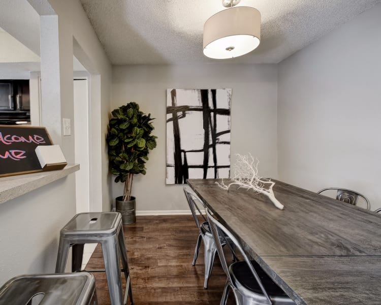 Beautiful dining table near kitchen at Oasis at Oakwell in San Antonio, Texas