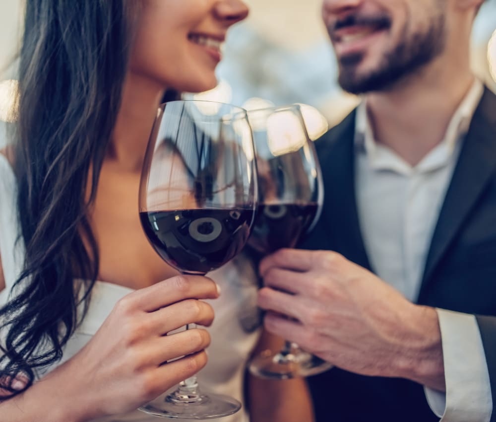 Resident couple out for a meal and some fine wine on date night near Haven Apartment Homes in Kent, Washington