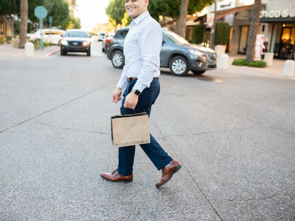 Resident finishing up some retail therapy near Avant at Fashion Center in Chandler, Arizona