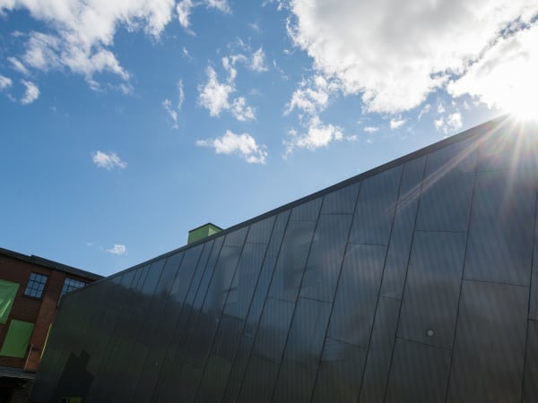 Low-angle view of the innovative building design at The Planet in Toronto, Ontario