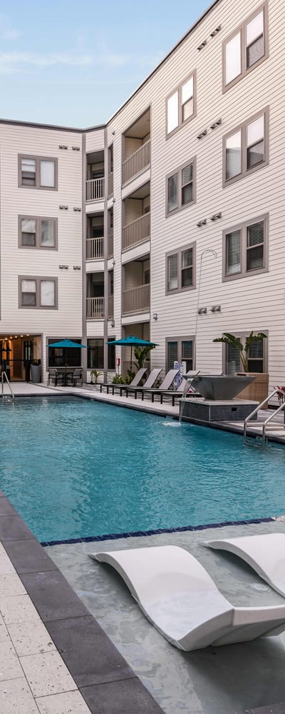 Large inground pool at Soba Apartments at Robbins Property Associates, LLC in Tampa, Florida