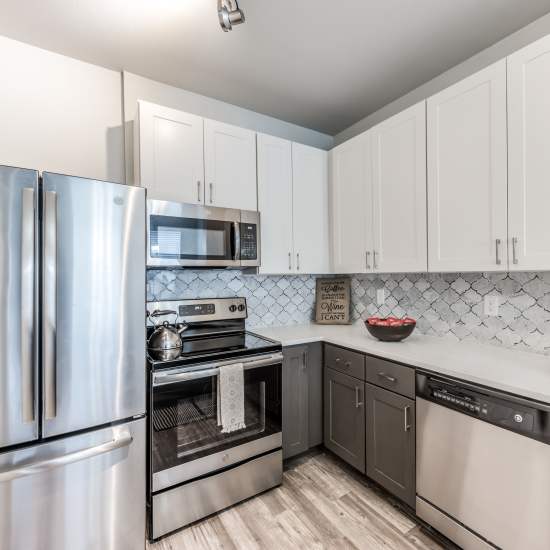 Kitchen with modern appliances at Lakeside in Houston, Texas