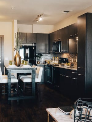 Gourmet kitchen with island seating at Terra at University North Park in Norman, Oklahoma