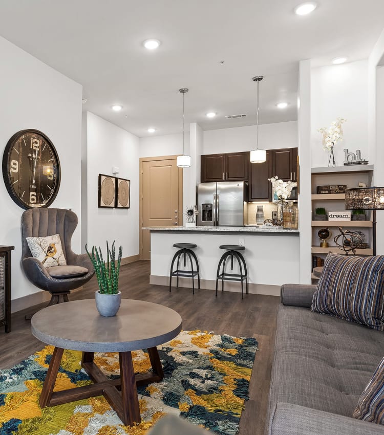 Model living room and breakfast bar at Villas at the Rim