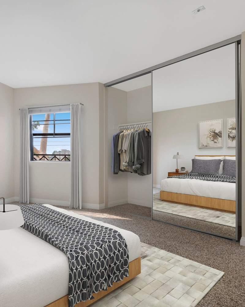 Model bedroom with large closet at The Jeremy in Los Angeles, California