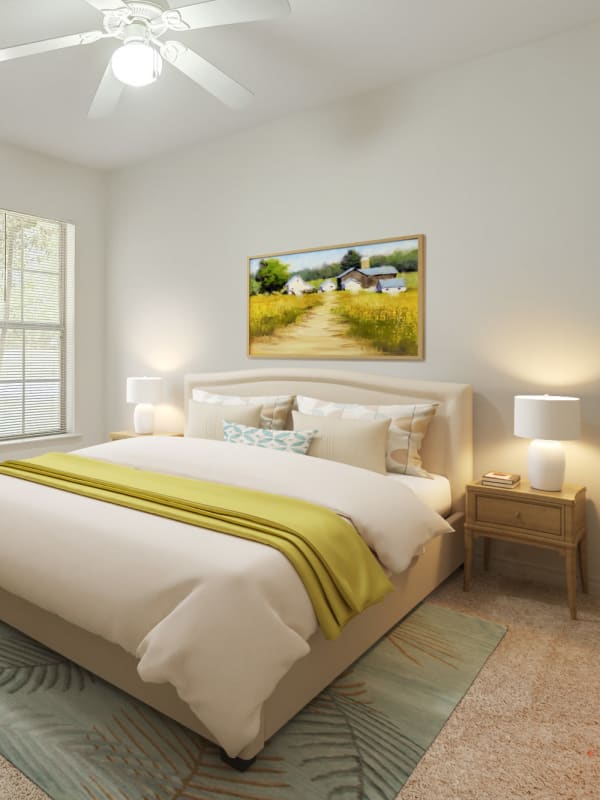 Well lit bedroom at Audubon Lake Apartments in Lafayette, LA