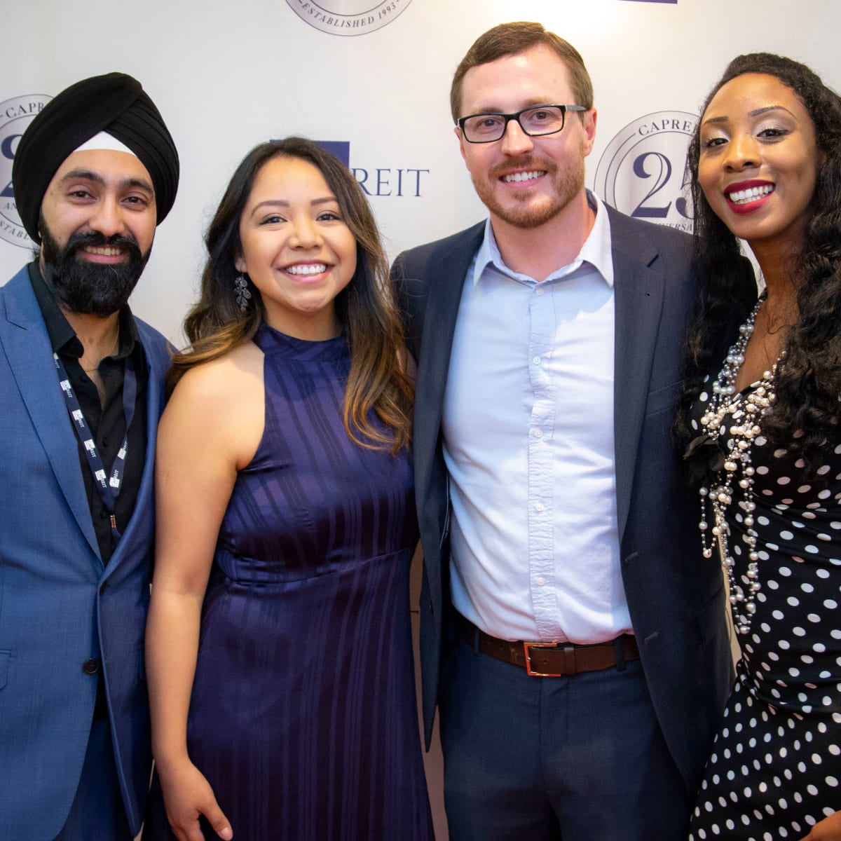 Employees posing at an event for a picture in Bethesda, Maryland