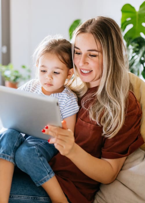 Resident with their child at Parc at Lyndhurst in Lyndhurst, New Jersey